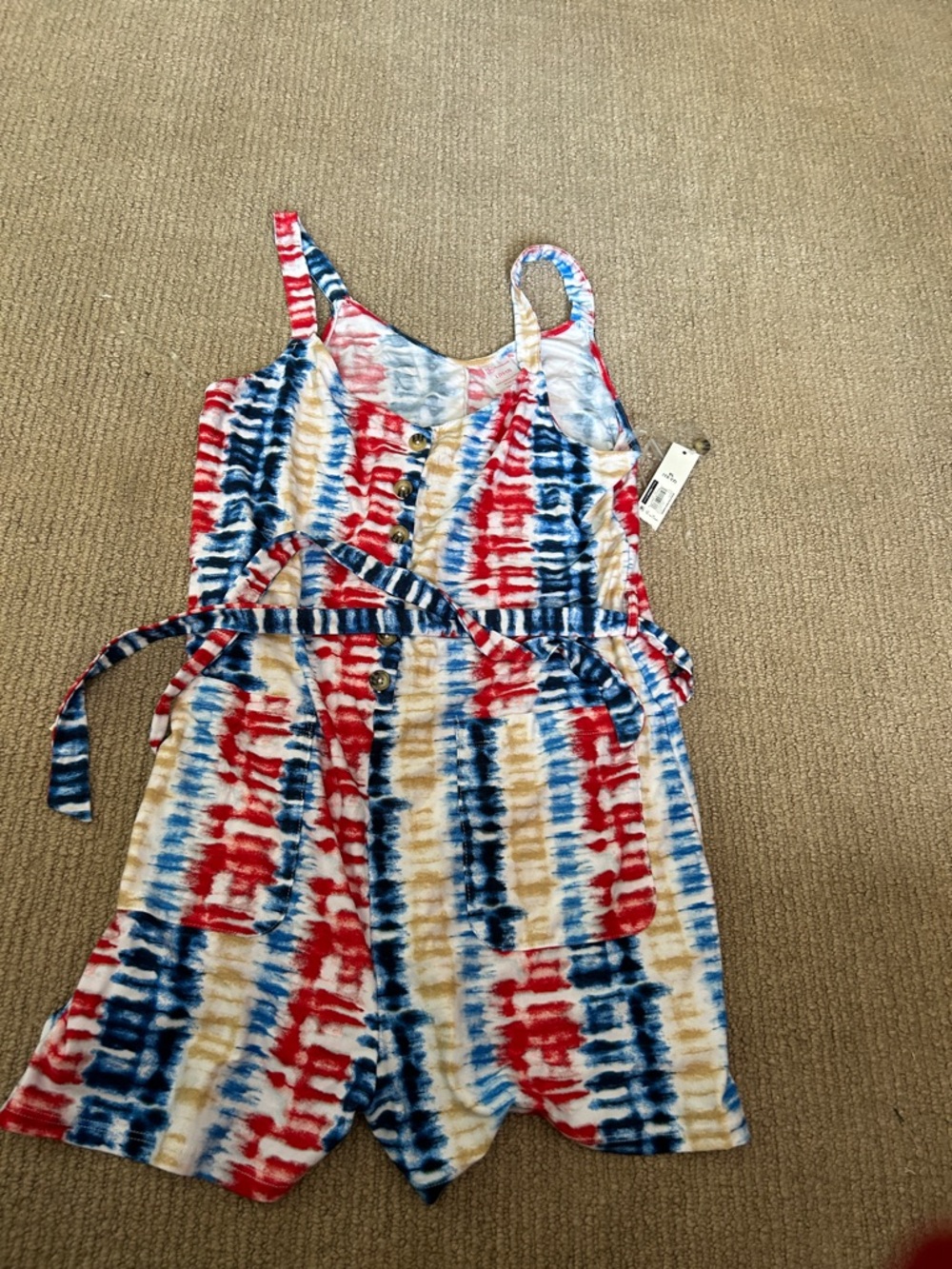 New with tags. No Boundaries women’s Tie-Dye Stripe Romper - Red, Blue, Tan